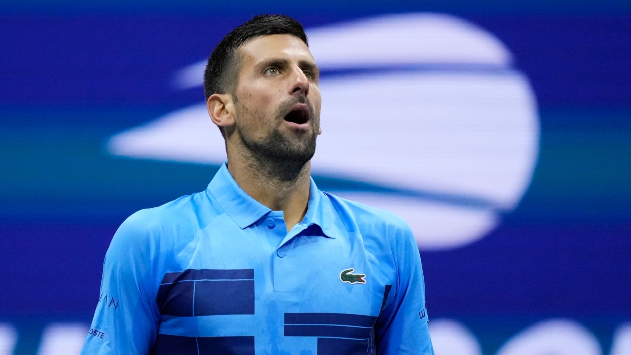 Novak Djokovic, of Serbia, reacts against Alexei Popyrin, of Australia, during a third round match of the U.S. Open tennis championships, Friday, Aug. 30, 2024, in New York. (AP Photo/Julia Nikhinson)