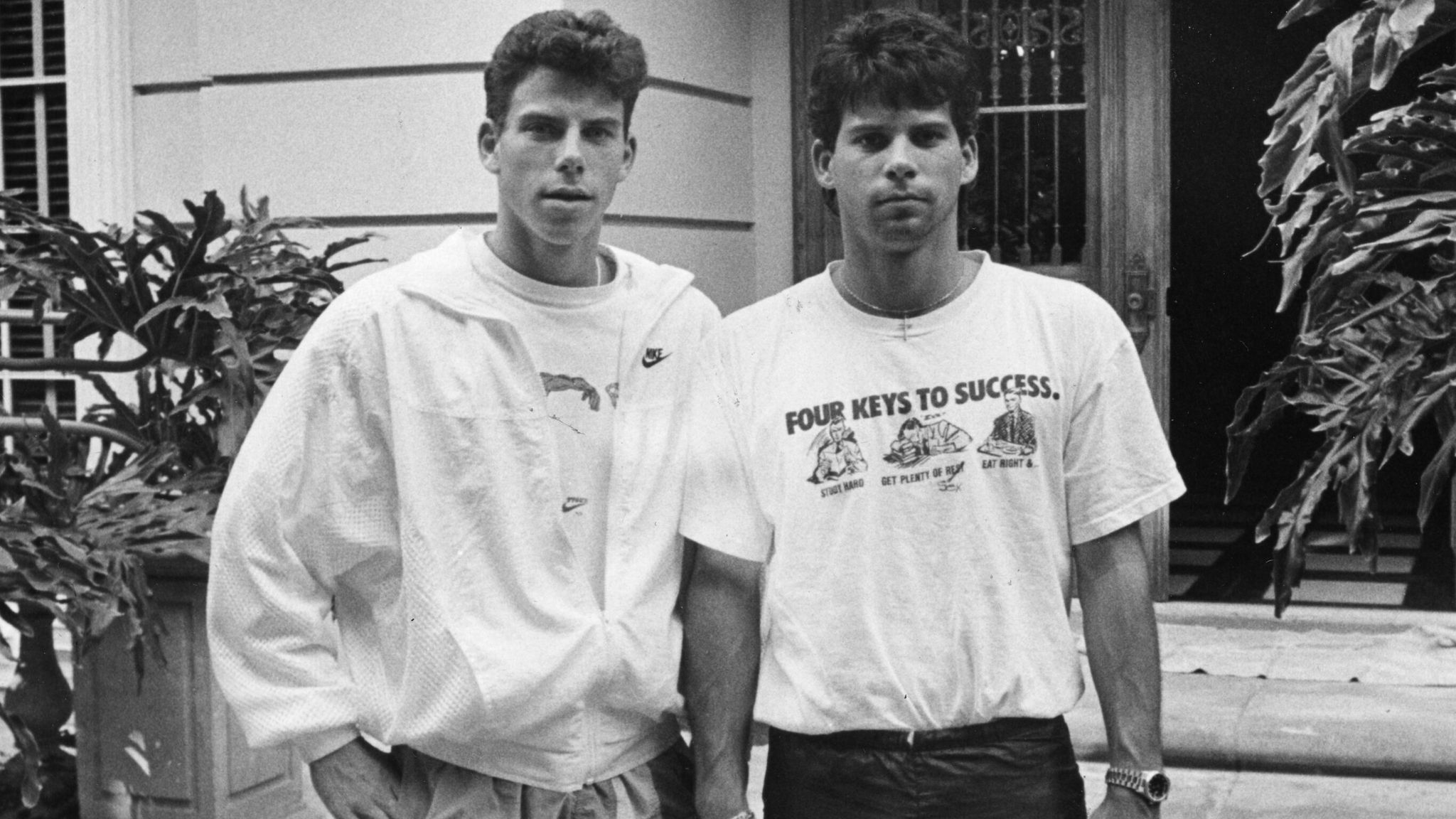 Erik Menendez (L) left and his brother Lyle (R) in front of their Beverly Hills home in November 1989. Pic: Getty