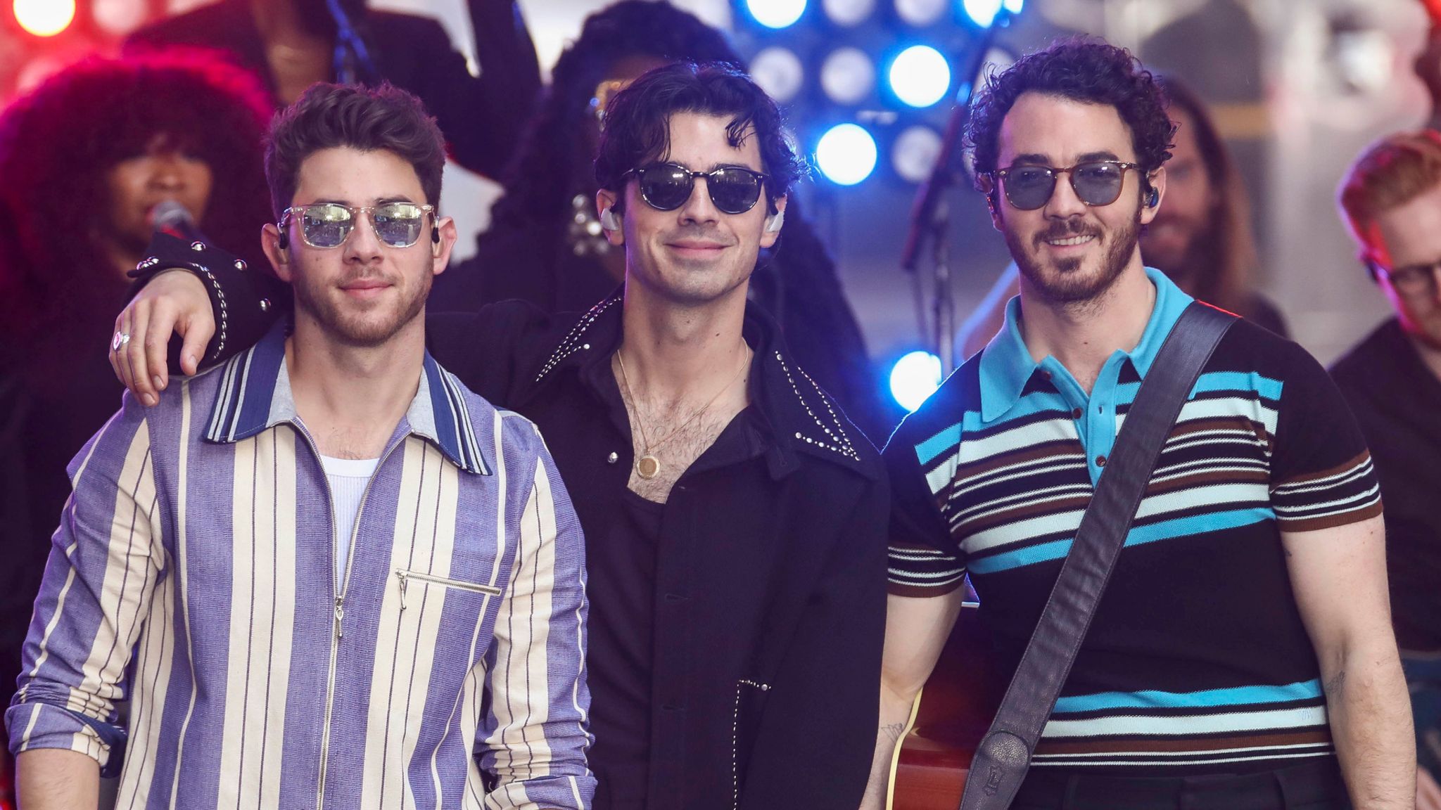 Nick Jonas, from left, Joe Jonas and Kevin Jonas of the Jonas Brothers perform on NBC's Today show at Rockefeller Plaza on Friday, May 12, 2023, in New York. (Photo by Andy Kropa/Invision/AP)