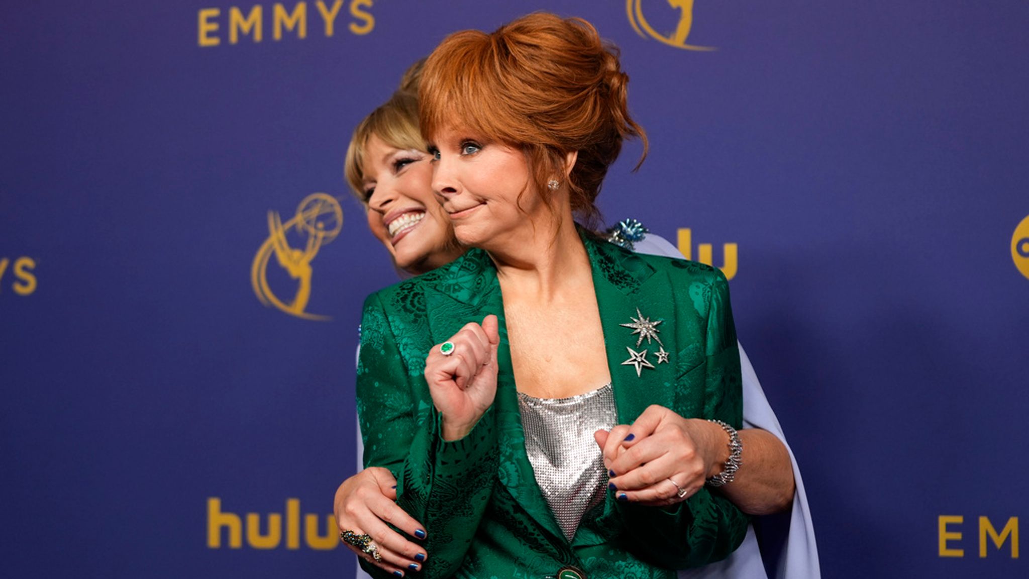 Melissa Peterman, left, and Reba McEntire arrive at the 76th Primetime Emmy Awards on Sunday, Sept. 15, 2024, at the Peacock Theater in Los Angeles. (AP Photo/Jae C. Hong)