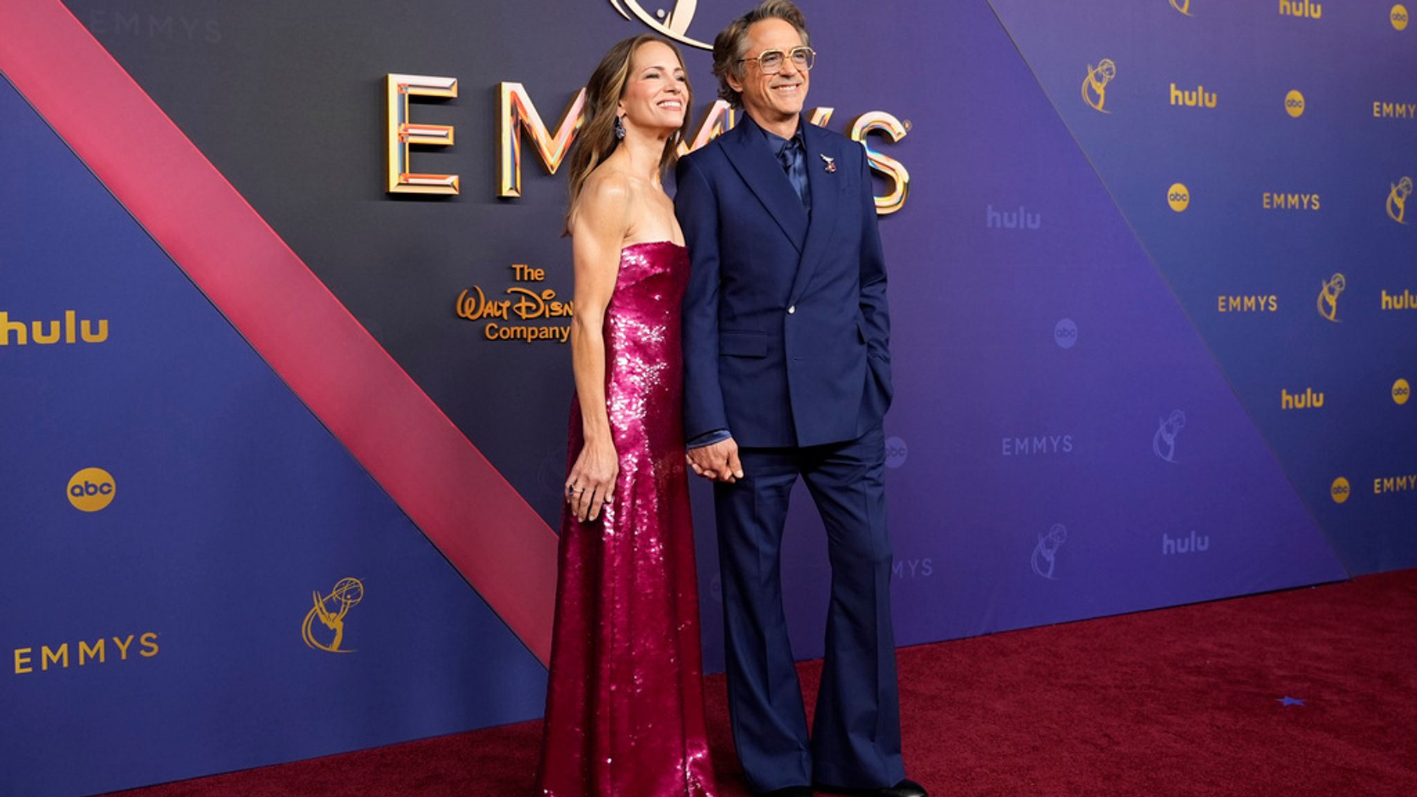 Susan Downey, left, and Robert Downey Jr. arrive at the 76th Primetime Emmy Awards on Sunday, Sept. 15, 2024, at the Peacock Theater in Los Angeles. (AP Photo/Jae C. Hong)