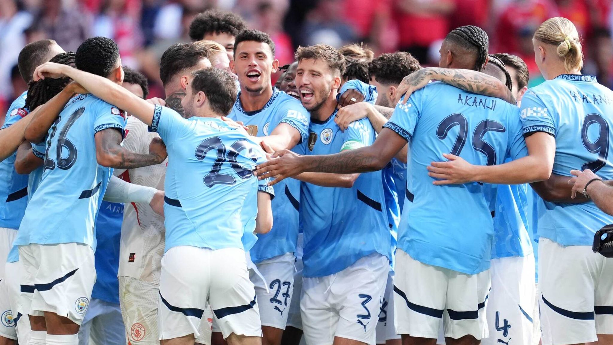 Manchester City players celebrate their penalty shootout victory over Manchester United in the Community Shield