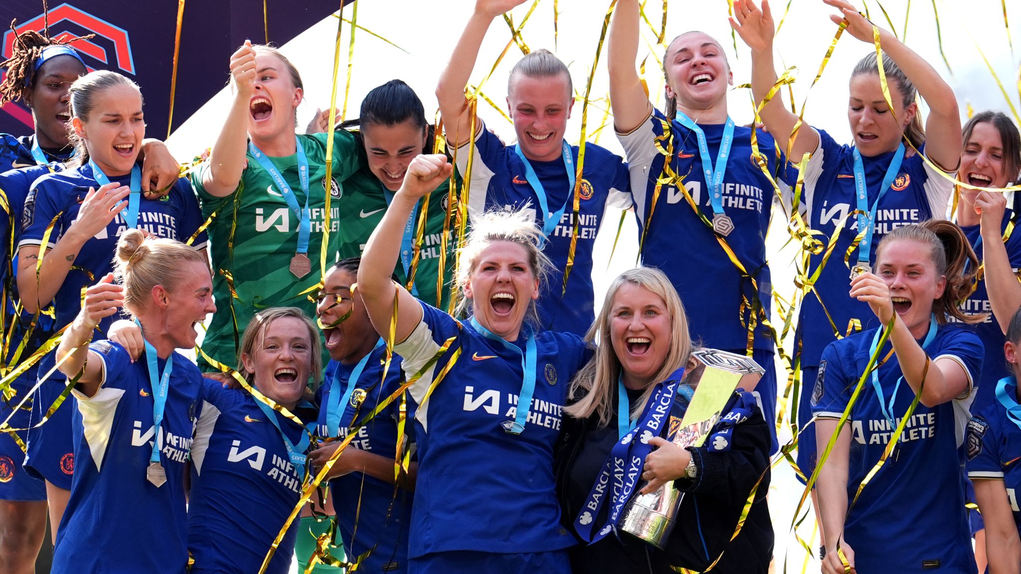 Chelsea manager Emma Hayes and Millie Bright celebrate with the WSL trophy