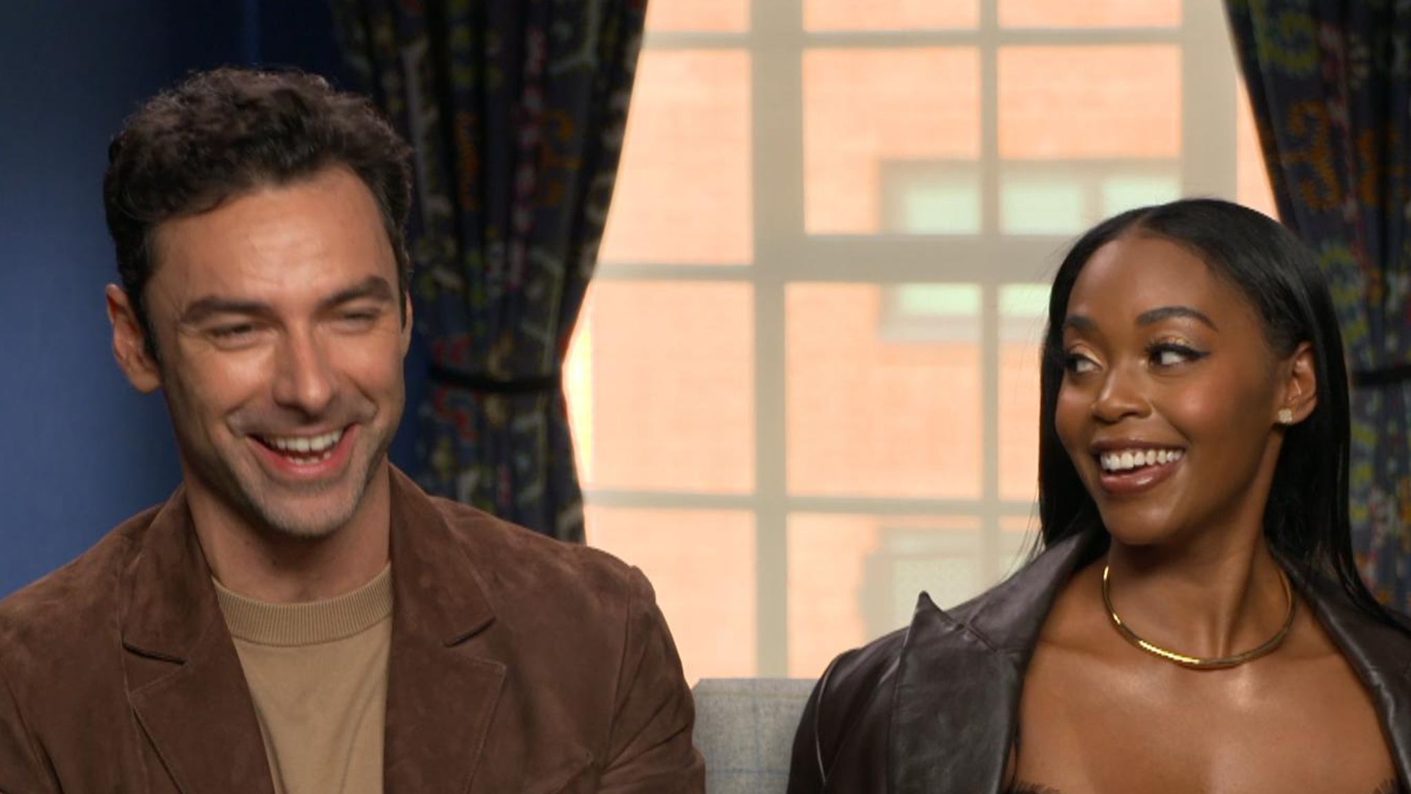 Aidan Turner (with Nafessa Williams) said Jilly Cooper was 'sharp as a tack'