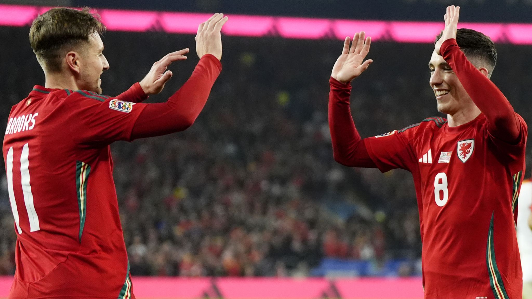 David Brooks celebrates with Harry Wilson after his penalty gave Wales a 1-0 lead over Montenegro