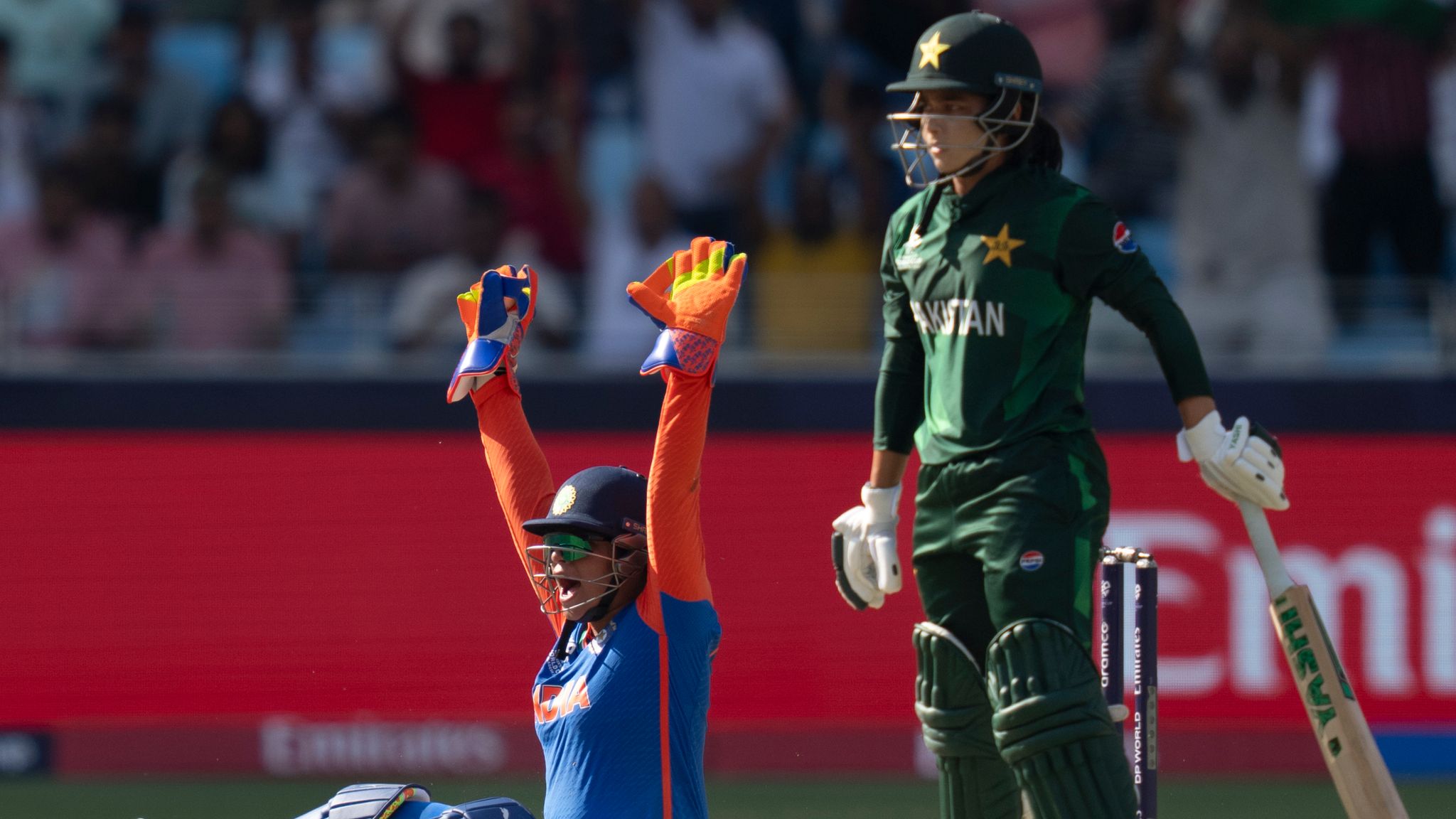 India's wicketkeeper Richa Ghosh, left, appeals successfully for the wicket of Pakistan's captain Fatima Sana during the ICC Women's T20 World Cup 2024 match between Pakistan and India at Dubai International Stadium, United Arab Emirates, Sunday, Oct. 6, 2024. (AP Photo/Altaf Qadri)