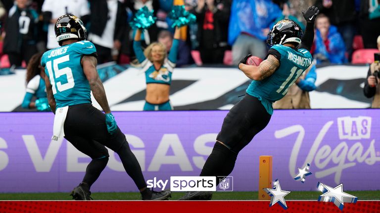 Jacksonville Jaguars wide receiver Parker Washington (11) celebrates with Jacksonville Jaguars wide receiver Tim Jones (15) after scoring a touchdown during an NFL football game at Wembley Stadium, Sunday, Oct. 20, 2024, in London. (AP Photo/Steve Luciano) 