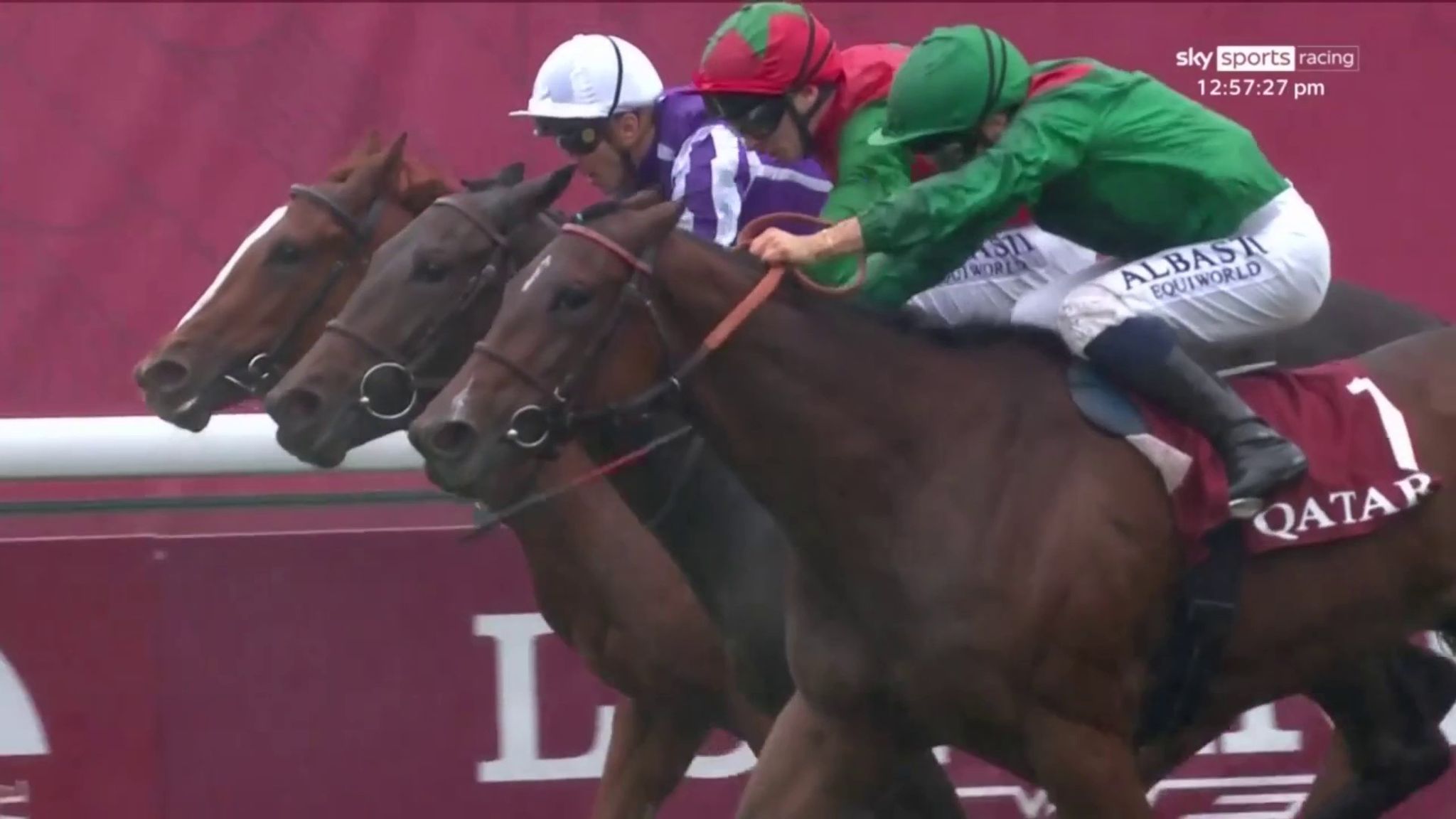 100/1 shock Vertical Blue (red cap) gets up to deny favourite Zarigana (near side) in the Prix Marcel Boussac