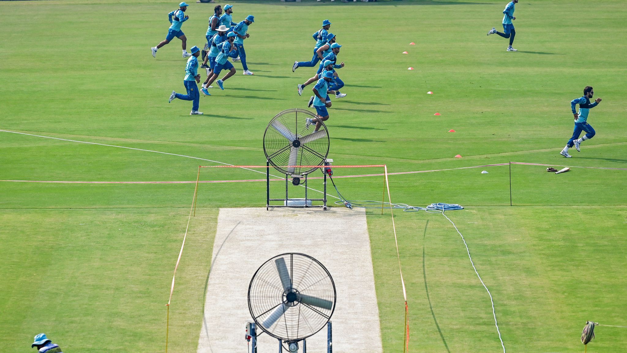 Pakistan's players warm up during a practice session ahead of their third and last Test cricket match against England at the Rawalpindi Cricket Stadium in Rawalpindi on October 21, 2024. (Photo by Aamir QURESHI / AFP)