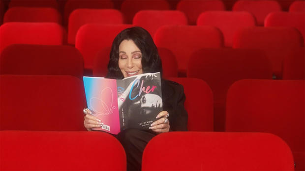 cher-with-her-memoir.jpg 