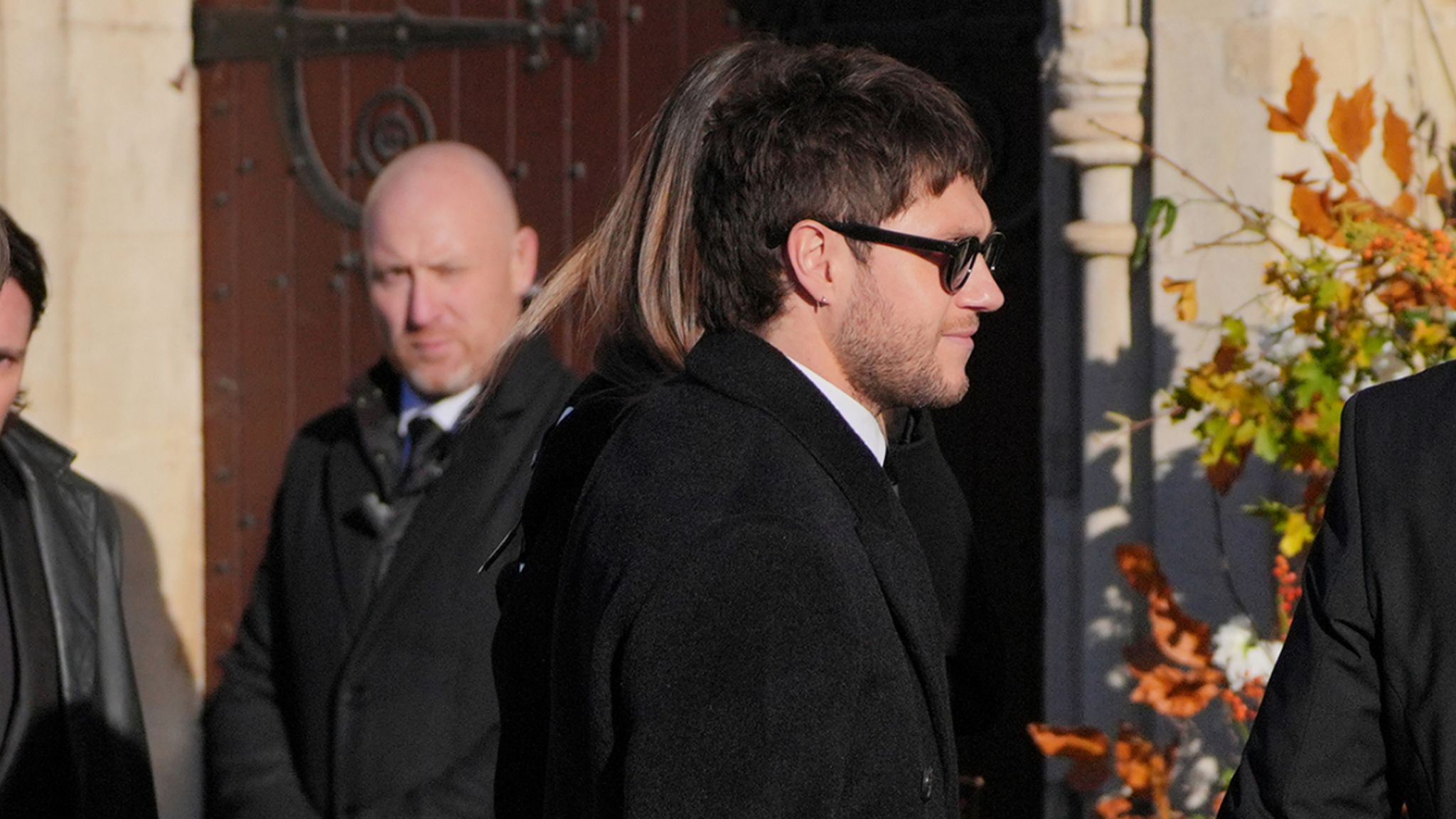 Former One Direction band member Niall Horan (centre) arrives for the funeral service of One Direction singer Liam Payne at St Mary's Church in Amersham, Buckinghamshire. Picture date: Wednesday November 20, 2024. PA Photo. The singer died after falling from a third-floor balcony of the Casa Sur Hotel in Buenos Aires last month, at the age of 31. See PA story FUNERAL Payne. Photo credit should read: Jonathan Brady/PA Wire