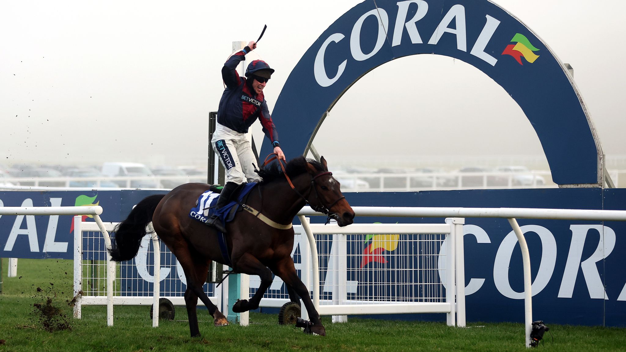 Gavin Sheehan celebrates as Datsalrightgino wins the Coral Gold Cup at Newbury