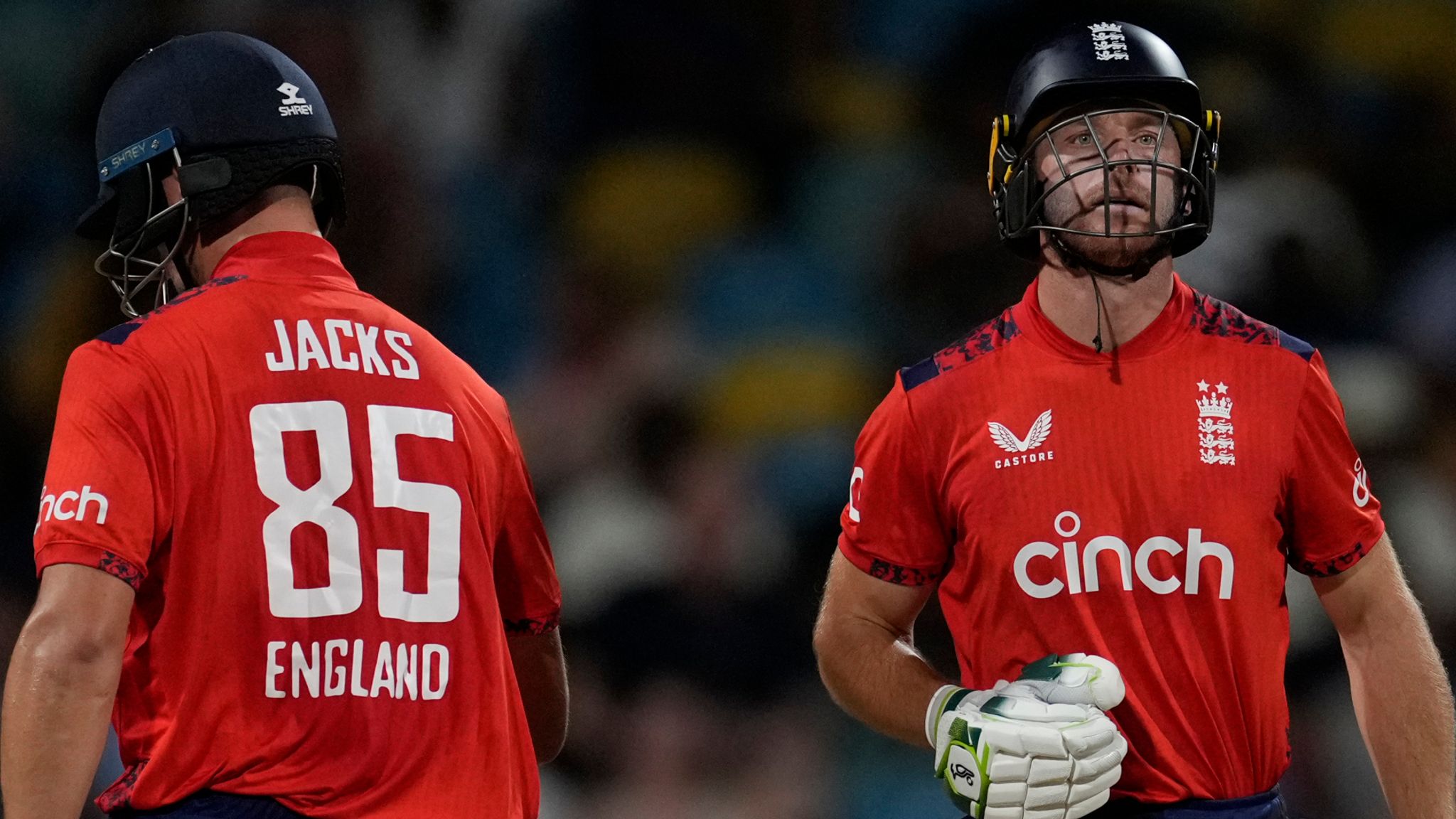 England's captain Jos Buttler celebrates runs during his partnership with Will Jacks in the second T20 cricket match against West Indies at Kensington Oval in Bridgetown, Barbados, Sunday, Nov. 10, 2024. (AP Photo/Ricardo Mazalan) 