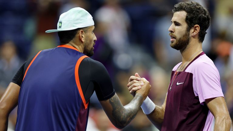 Nick Kyrgios shakes hands with Karen Khachanov after a men&#39;s singles quarterfinal match at the 2022 US Open, Tuesday, Sep. 6, 2022 in Flushing, NY. (Simon Bruty/USTA via AP)