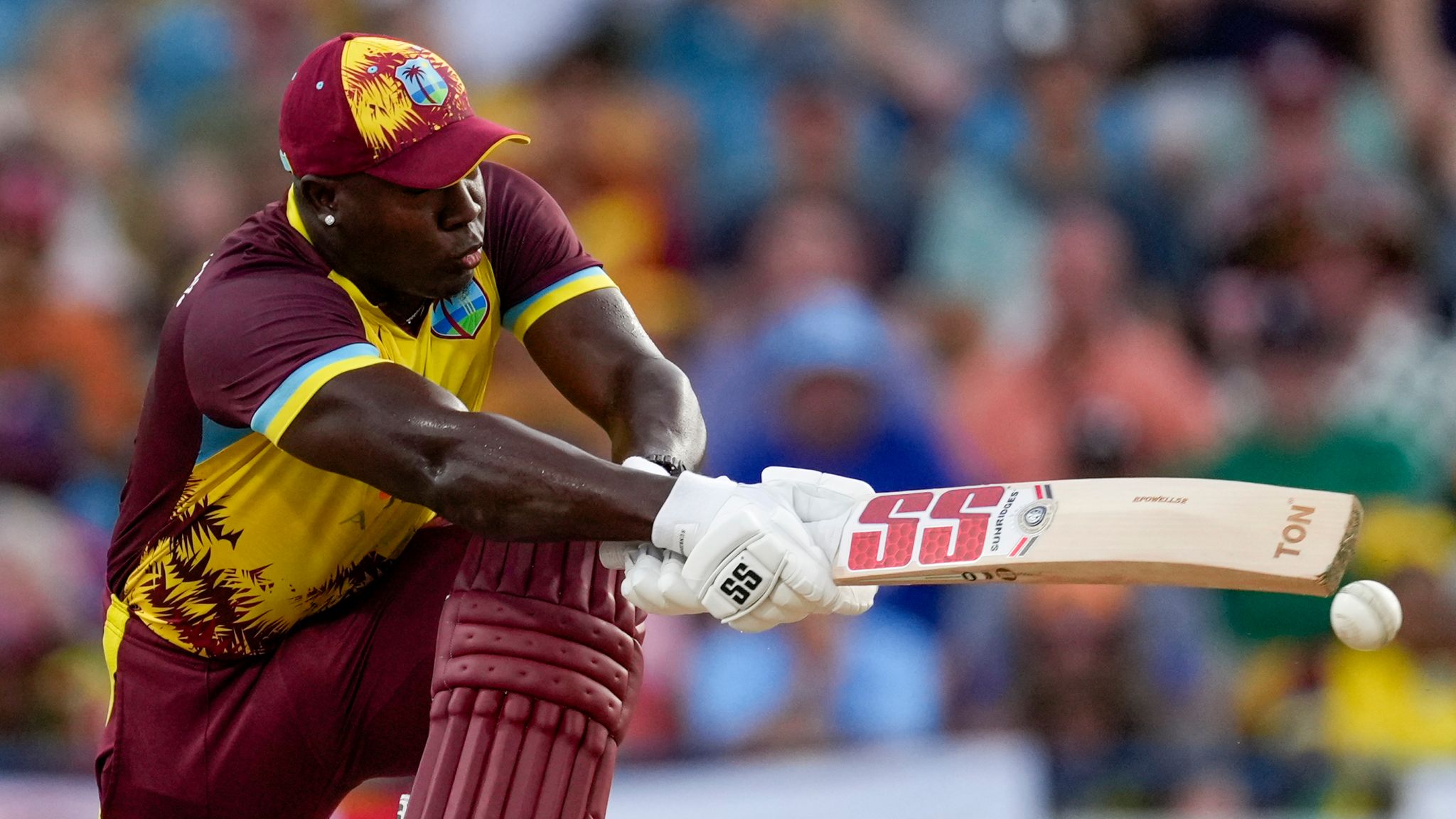 West Indies' captain Rovman Powell plays a shot against England during the second T20 cricket match at Kensington Oval in Bridgetown, Barbados, Sunday, Nov. 10, 2024. (AP Photo/Ricardo Mazalan) 