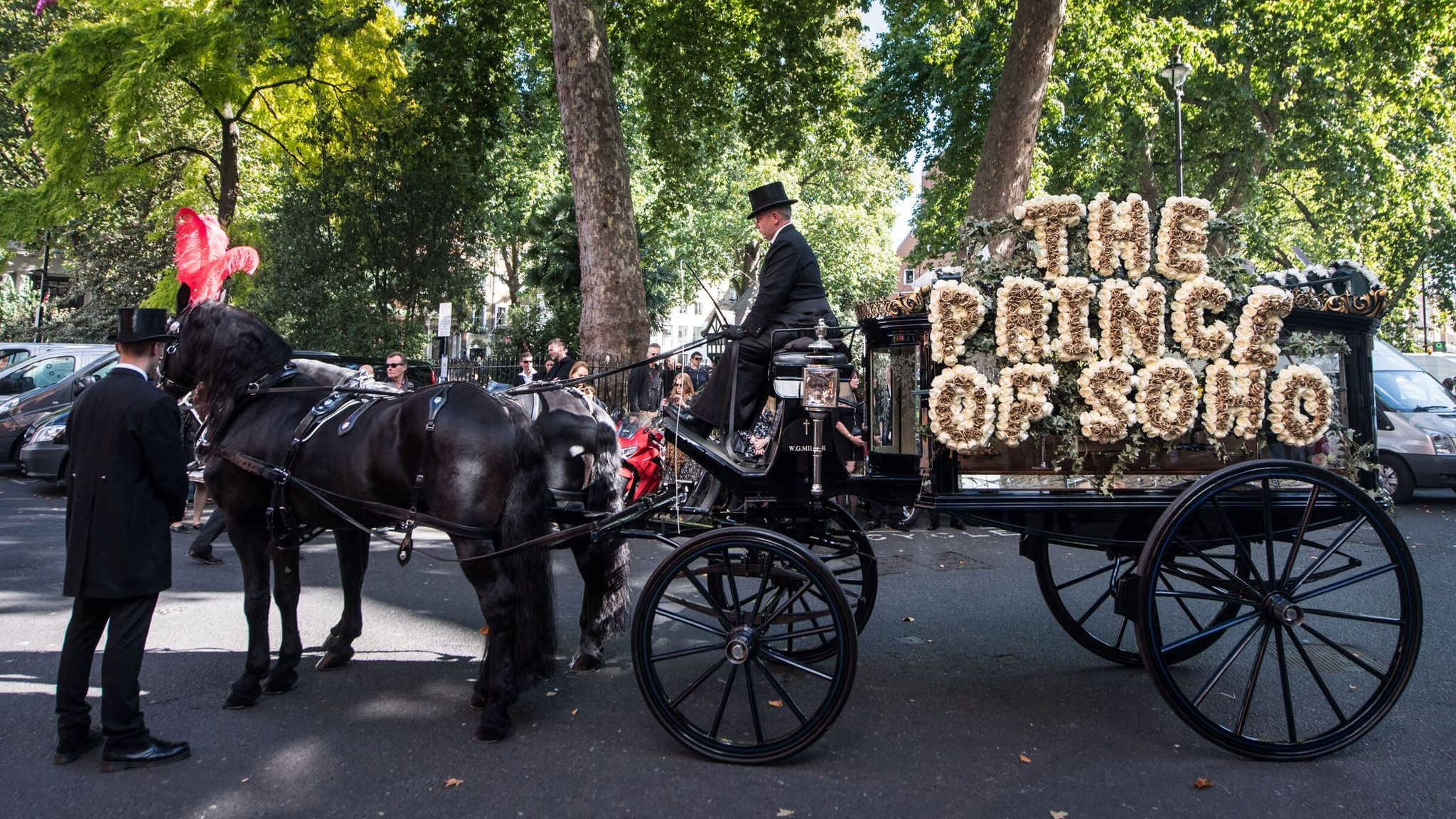 Mandatory Credit: Photo by James Gourley/Shutterstock A horse drawn hearse with a floral tribute reading 'The Prince of Soho' Bernie Katz funeral procession, Soho, London, UK - 22 Sep 2017