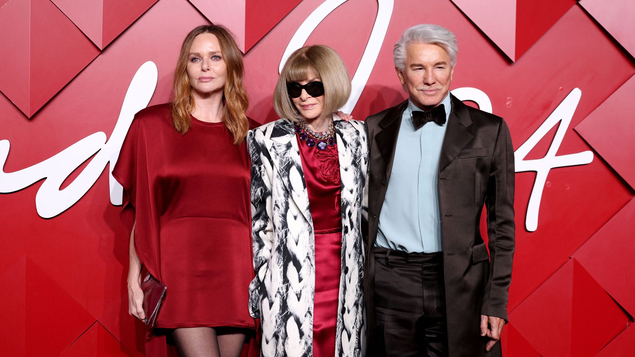 Stella McCartney, Anna Wintour and Baz Luhrmann pose on the red carpet of The Fashion Awards 2024 at the Royal Albert Hall in London, Britain