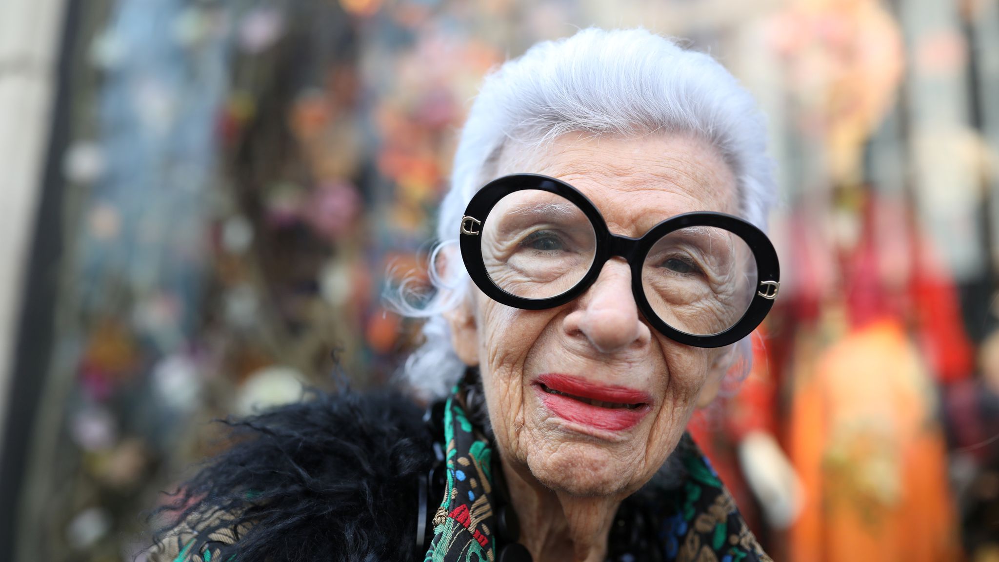 Fashion icon and businesswoman Iris Apfel looks at the window displays at Bergdorf Goodman in Manhattan, New York City, U.S., September 5, 2017. REUTERS/Stephen Yang