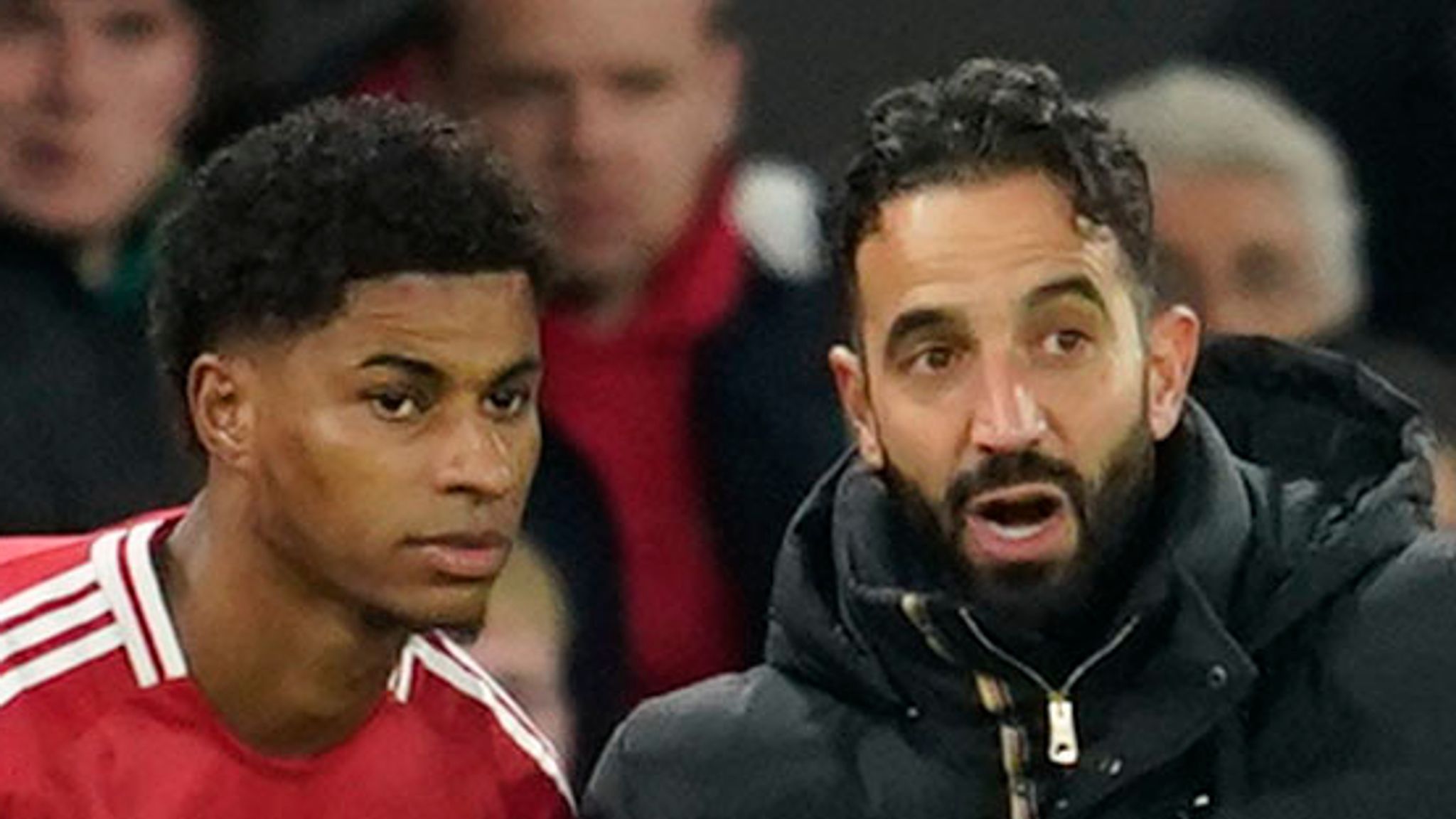 Manchester United's head coach Ruben Amorim, right, gives instructions to Manchester United's Marcus Rashford during the Europa League opening phase soccer match between Manchester United and Bodo Glimt, at the Old Trafford stadium in Manchester, England, Thursday, Nov. 28, 2024. (AP Photo/Dave Thompson)