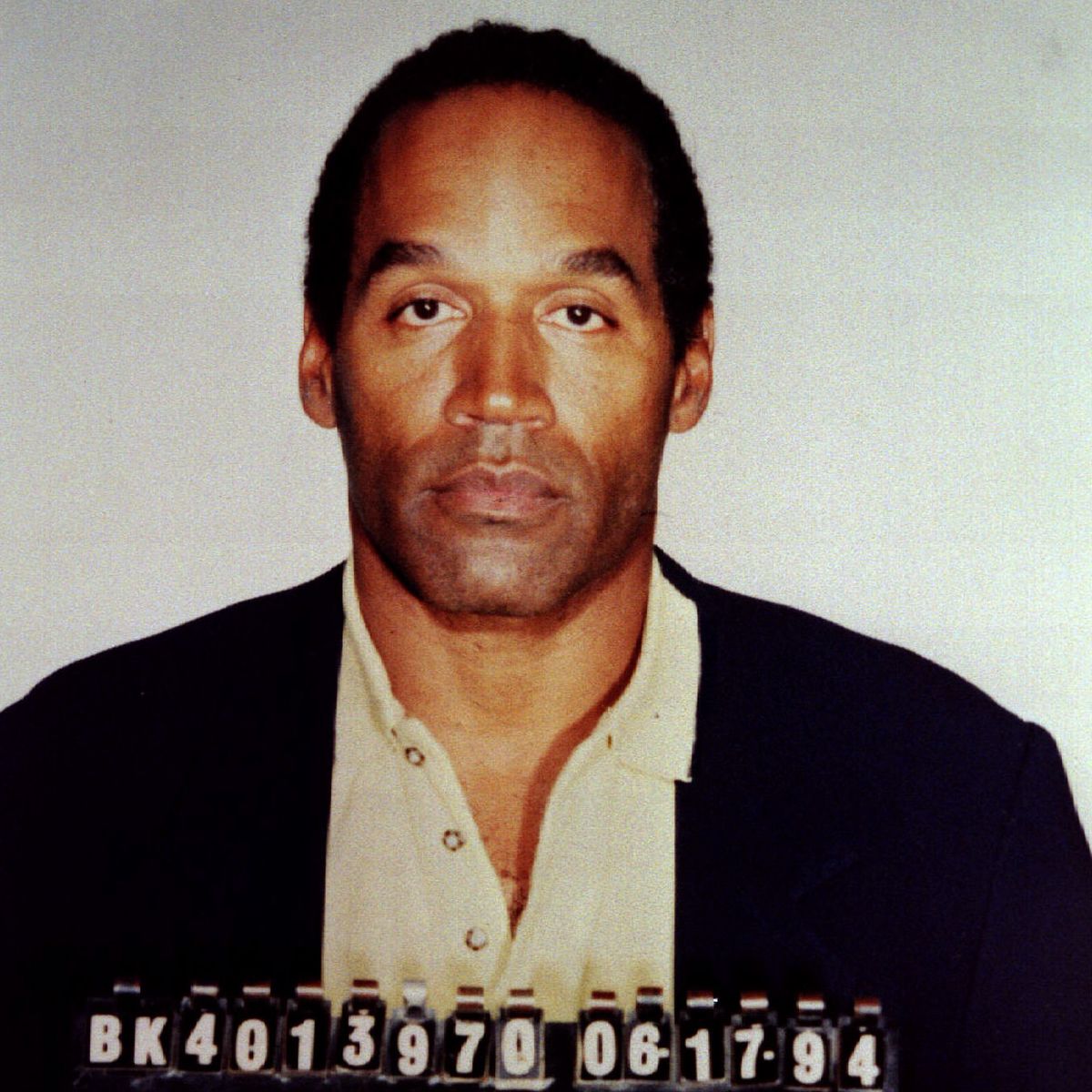 OJ Simpson is shown in his official Los Angeles Police Department booking photo following his arrest for two murders Pic: Reuters