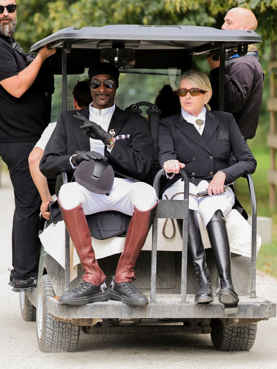 03 August 2024, France, Versailles: Olympics, Paris 2024, equestrian sport, dressage, team, final, US rapper Snoop Dogg rides a golf cart. Pic: PA 