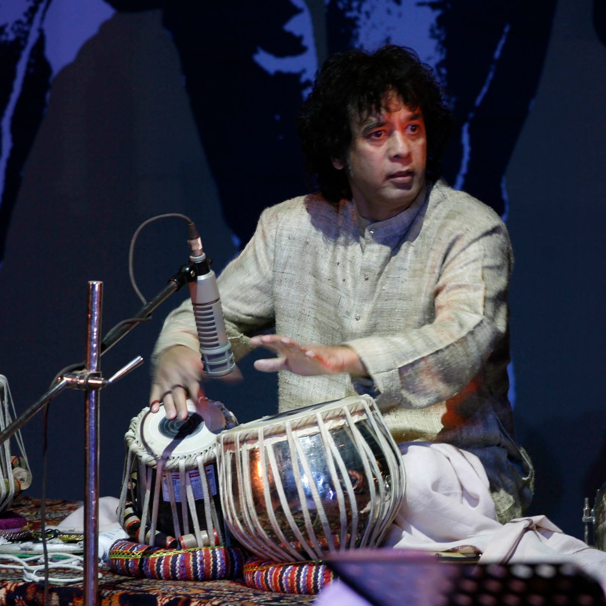 FILE - Indian drum maestro Zakir Hussain performs at the "Living Dream Concert" in New Delhi, India, on Feb. 16, 2009. (AP Photo/Mustafa Quraishi, File)