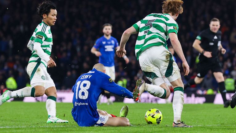 Celtic&#39;s Liam Scales pulls down Rangers&#39; Vaclav Cerny at the edge of the penalty box 