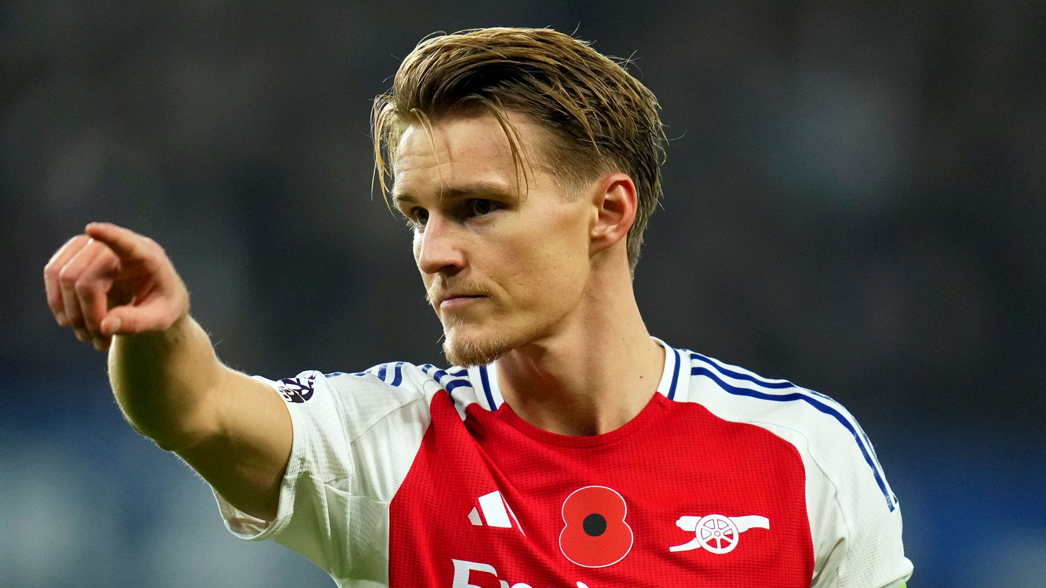 Arsenal's Martin Odegaard gestures during the English Premier League soccer match between Chelsea and Arsenal at Stamford Bridge stadium in London, Sunday, Nov. 10, 2021. (AP Photo/Kirsty Wigglesworth)