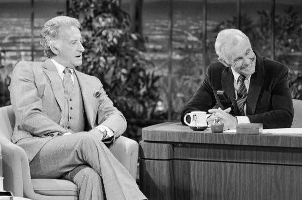 Sportscaster Bob Uecker is seen during an interview on "The Tonight Show" with host Johnny Carson on Nov. 16, 1983. 