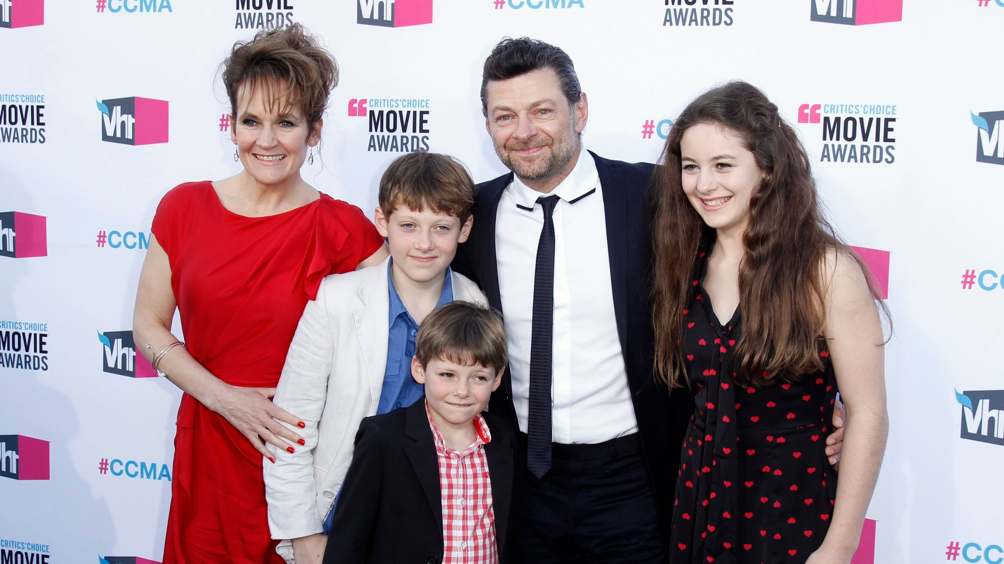 A young Louis (2nd L) with his family on the red carpet in 2012. Pic: Reuters