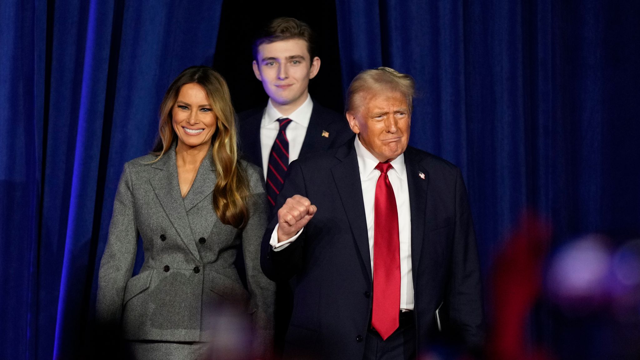 Donald Trump, Melania and Barron arrive at an election night watch party. Pic: AP