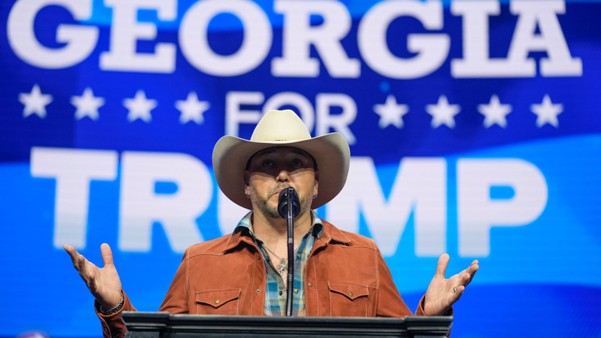 Jason Aldean speaking at a Republican rally in October. Pic: AP