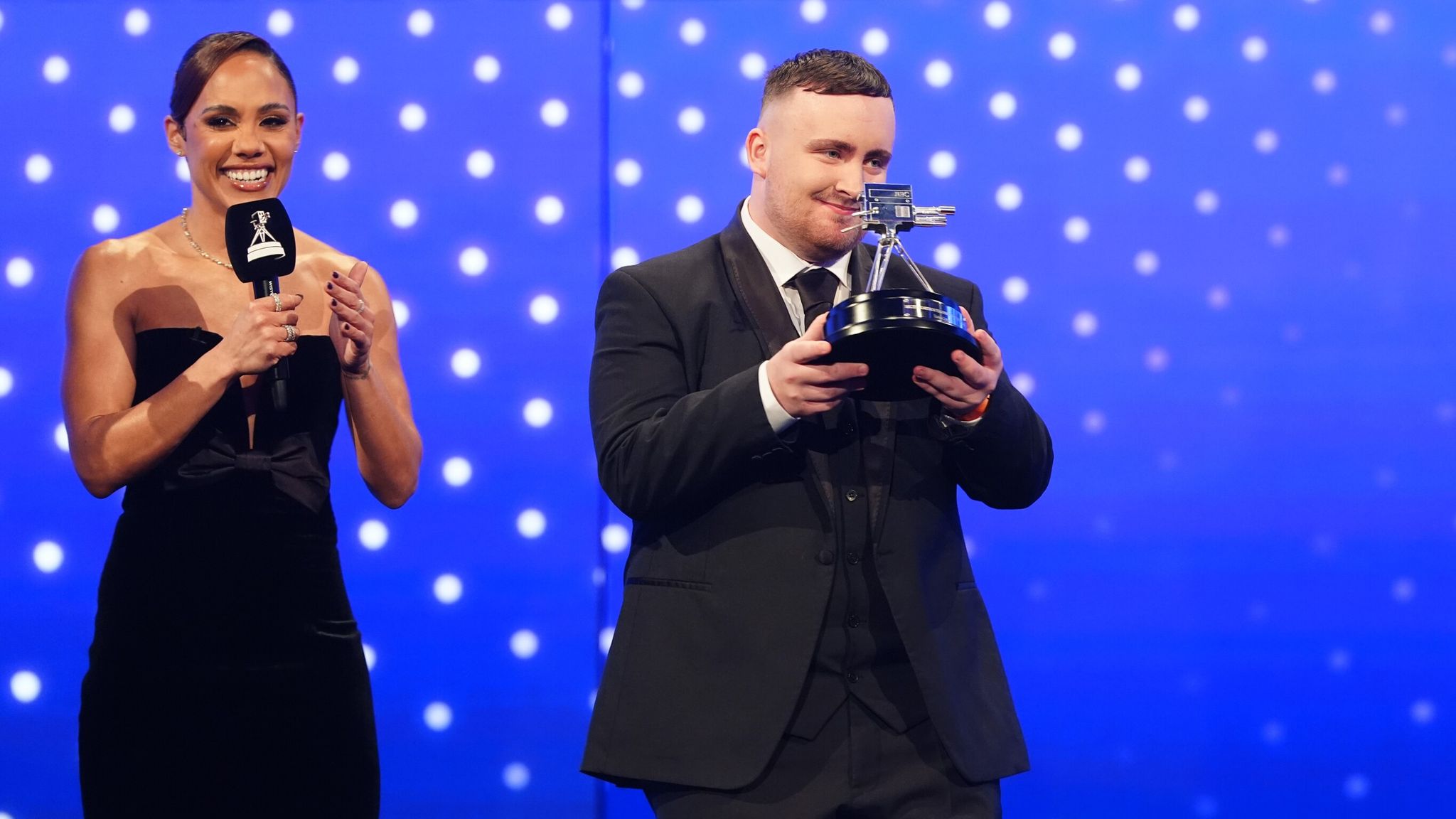 Littler accepts BBC Young Sports Personality of the Year award. Pic: PA