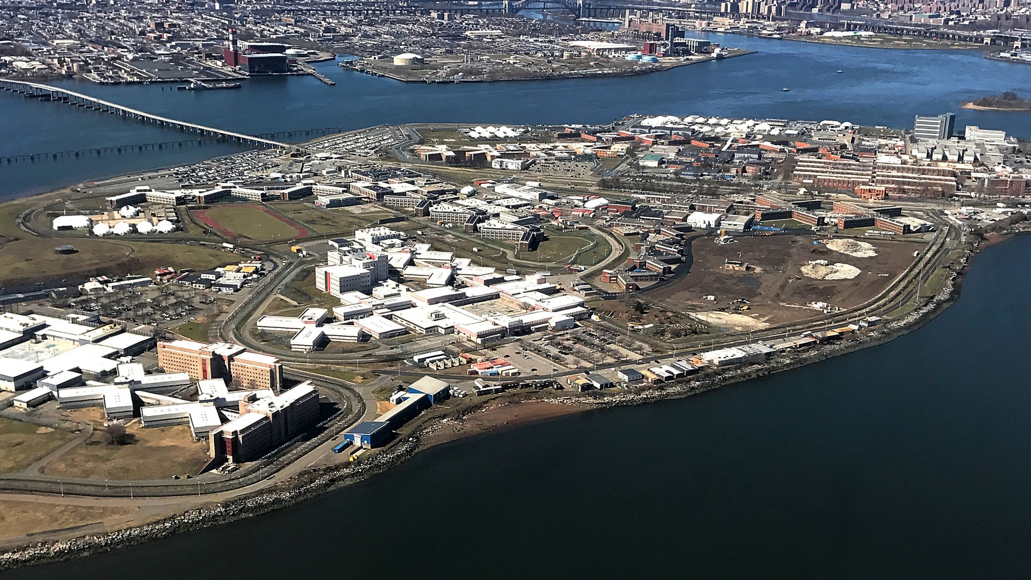 The Rikers Island Prison complex (foreground) is seen from an airplane in the Queens borough of New York City, New York, U.S., April 2, 2017. REUTERS/Mike Segar 