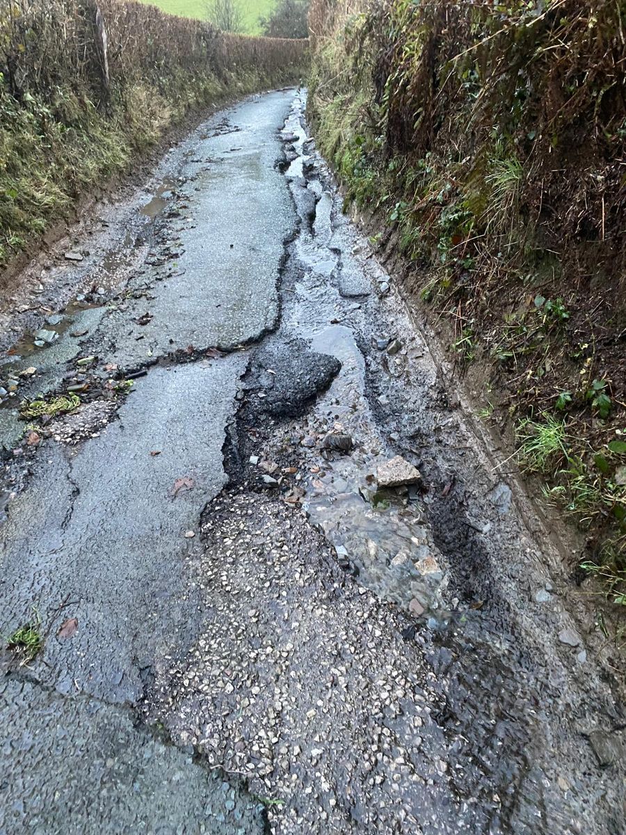 The condition of the road in "Pothole Land", Wrexham