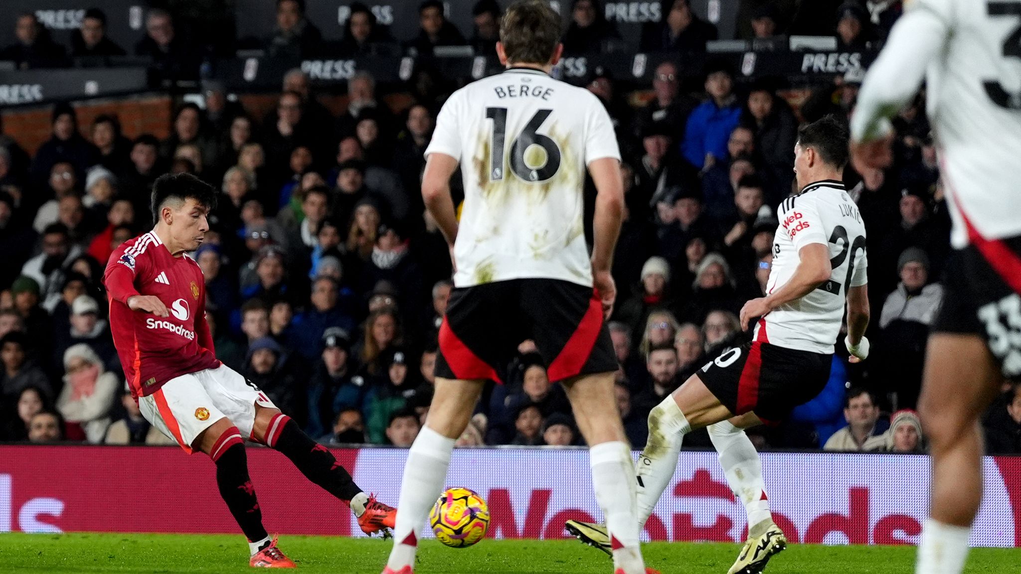 Manchester United's Lisandro Martinez scores against Fulham