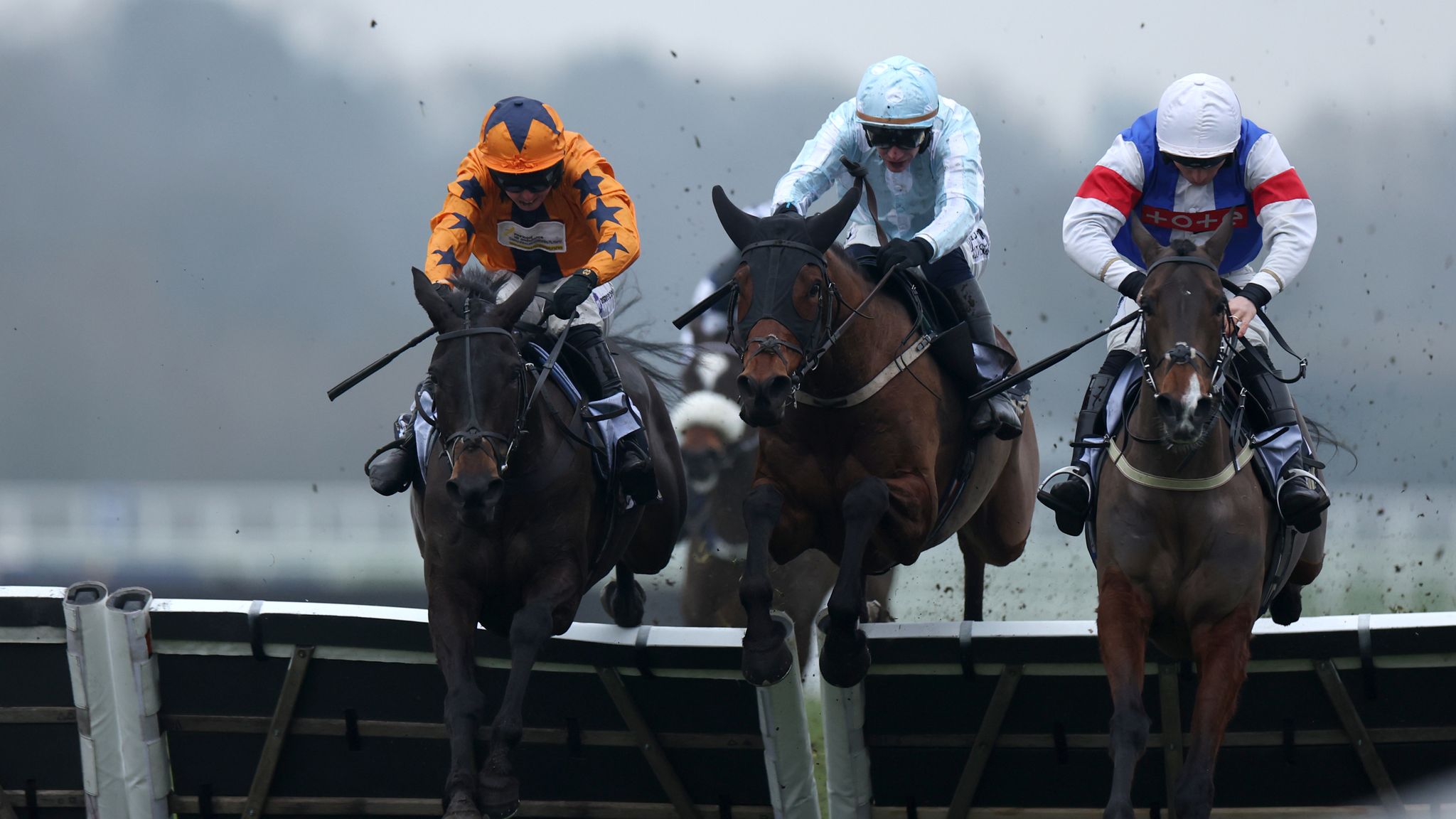 Take No Chances (left) holds off hot favourite Kargese in the BetMGM Mares' Hurdle at Ascot