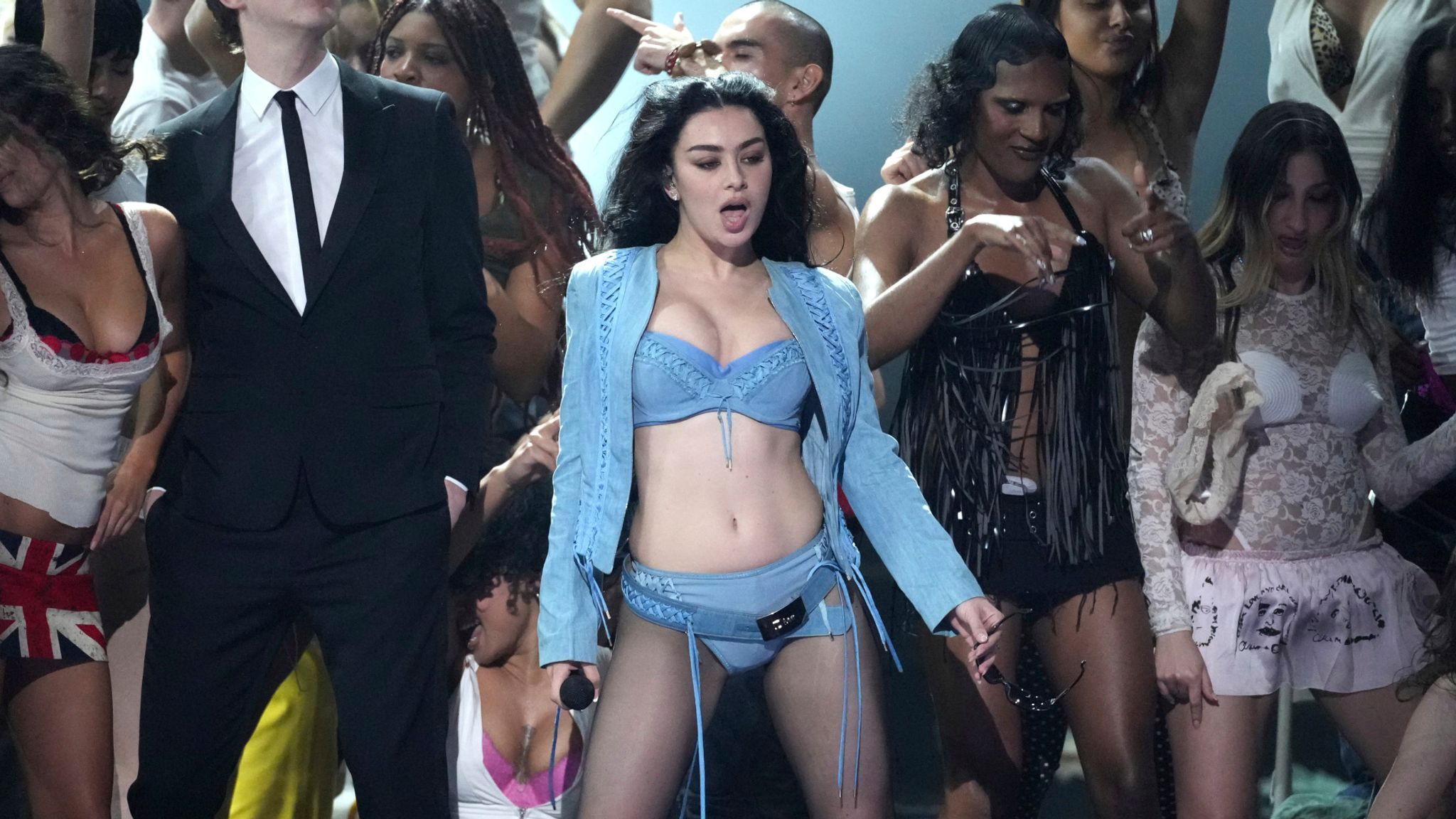 Charli XCX performs with The Dare during the 2025 Grammy Awards. Pic: AP/Chris Pizzello