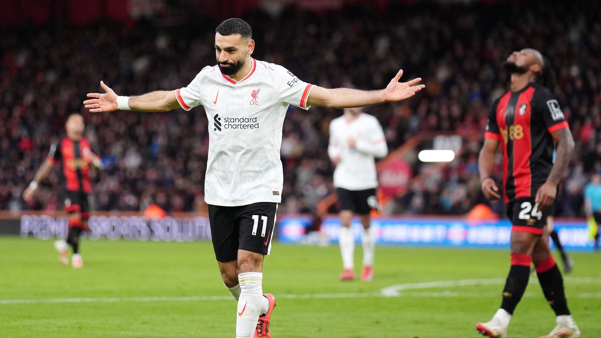 Mohamed Salah celebrates scoring his, and Liverpool's second goal of the game